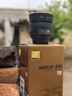 Nikon 35mm 1.8g new 10. by 10