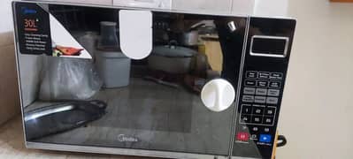 midea 30L grill microwave oven fro sale condition is perfect
