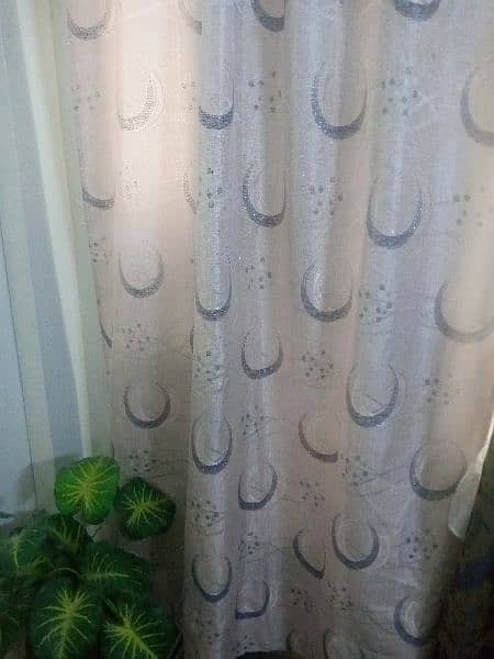 Used curtain pair . . 0