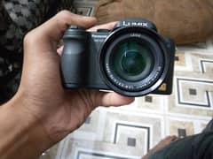 camera Panasonic DMC-FZ7 camera + battery + charger + SD card