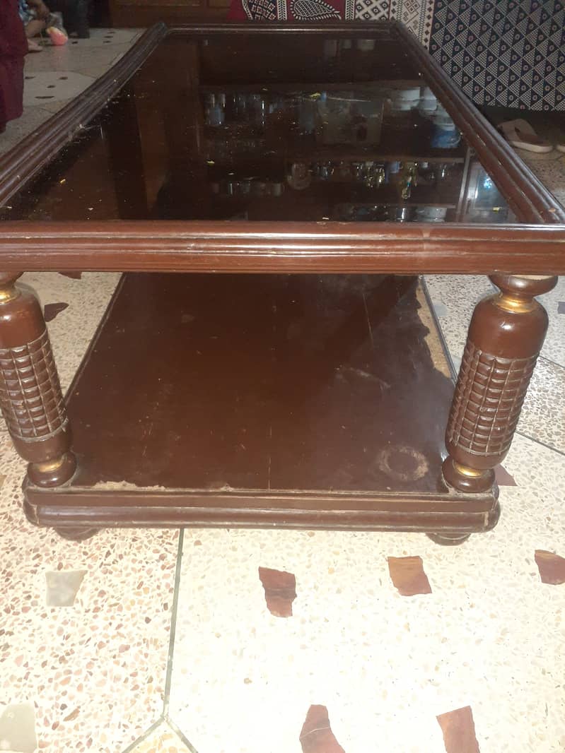 Central table of wooden with glass top 1
