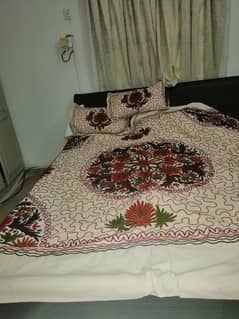 Hand embroidered bed cover with 2 pillow cases.