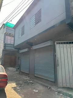 2 Marla Corner House With 2 Shops Double Story 0