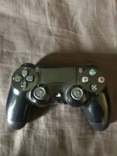 PlayStation 4 controllers and a ps4 video game