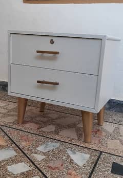 beautiful white side table with deco paint