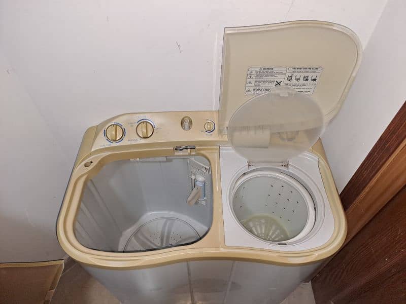 Haier Washing Machine with Drayer 8 kg Size 2