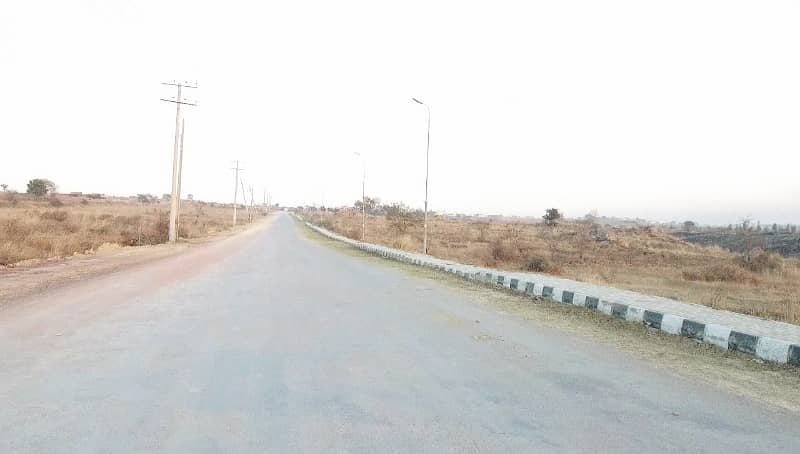 Buy your ideal Main Double Road 1 Kanal Residential Plot in a prime location of Islamabad 13