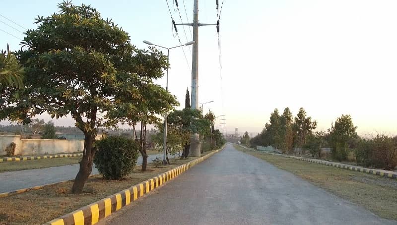 Buy your ideal Main Double Road 1 Kanal Residential Plot in a prime location of Islamabad 14