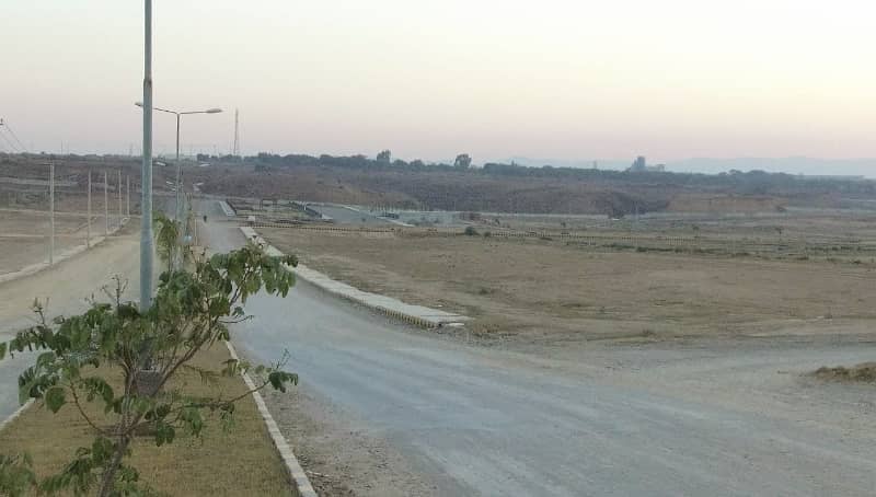 Buy your ideal Main Double Road 1 Kanal Residential Plot in a prime location of Islamabad 17