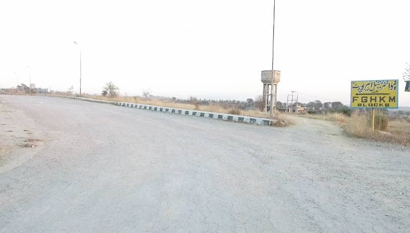 Buy your ideal Main Double Road 1 Kanal Residential Plot in a prime location of Islamabad 18