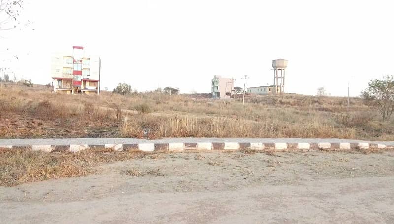 Buy your ideal Main Double Road 1 Kanal Residential Plot in a prime location of Islamabad 20