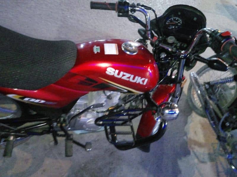 Suzuki 110 red colour new condition 1st owner 2