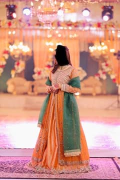 long heavy open cut gown with lehnga