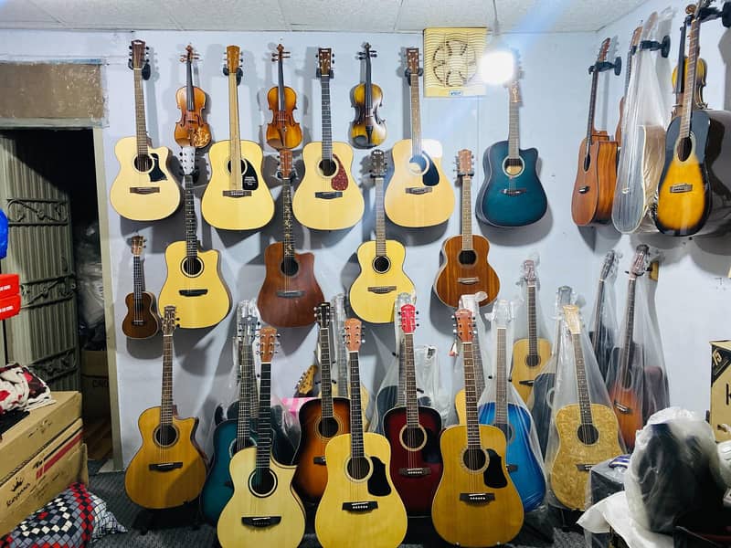 The Guitar Store Pakistan Biggest Variety of Guitars violins Musical 17