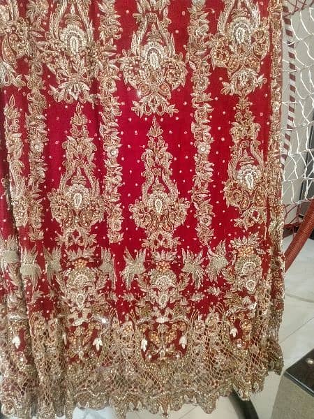 Red and goldn colors bridal lahnga very low price itny mn koi ni dy ga 2