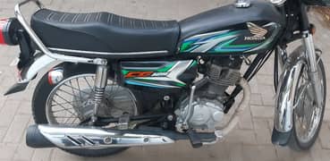 Honda 125 2023 model serial 30 for sale in 200,000, like new 4000km