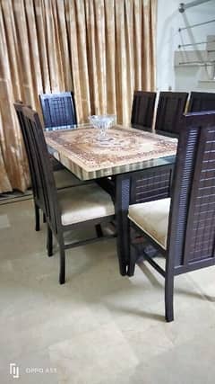 Dinning table with 8 chairs. 0