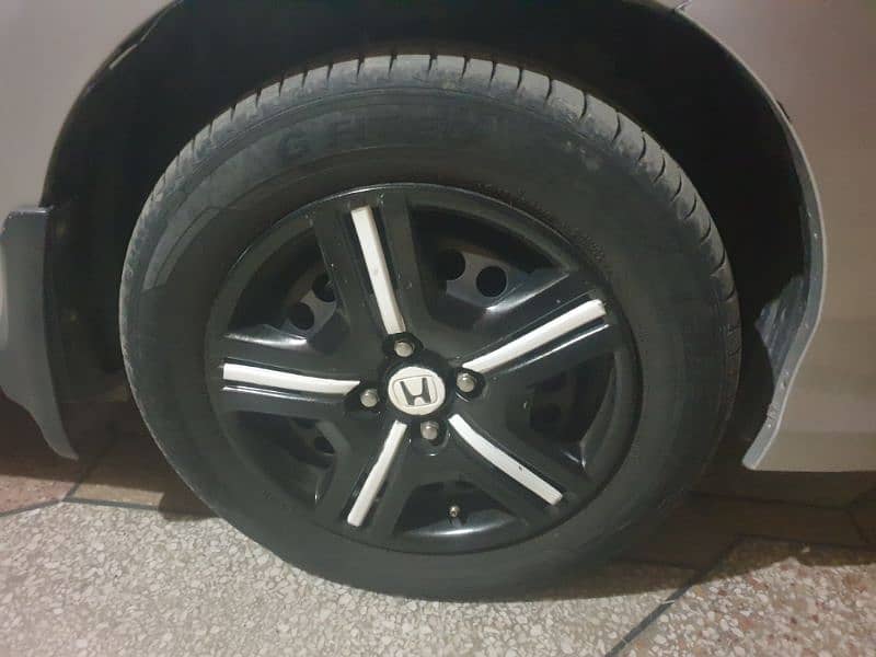 Stylish Tyres made in Indonesia with Rims and Wheelcovers 1