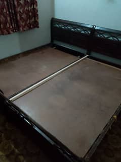 2 single Woden bed with original molty foam mattress,okay condition