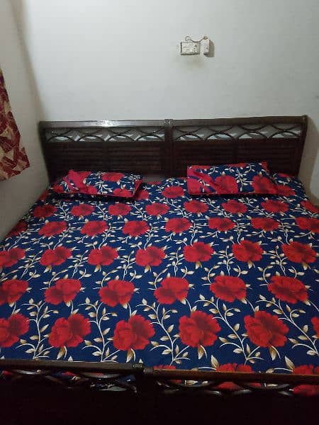 2 single Woden bed with original molty foam mattress,okay condition 6