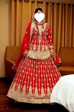 Red Bridal Lehnga dress .