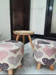 2 stools with center table. Kids cushions.   Kids animated pillows
