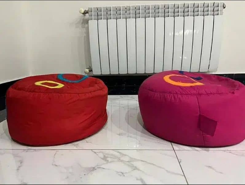 2 stools with center table. Kids cushions.   Kids animated pillows 6
