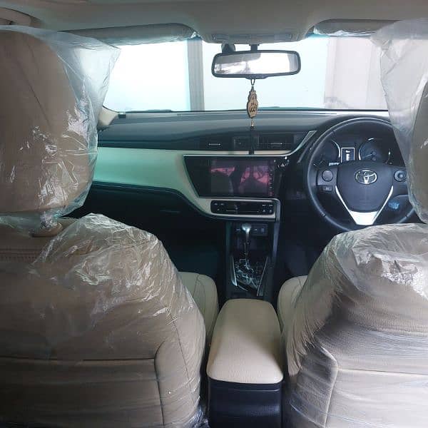 Toyota Corolla Grande 1.8 X CVT with Beige interior 4