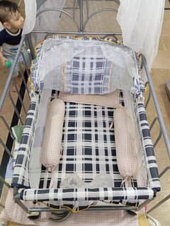 Baby cot with swing