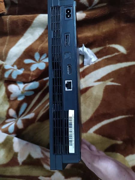 PS3 Slim and Games 3