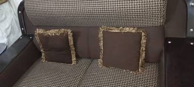Brown and Black Wooden sofa