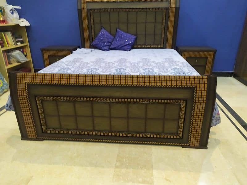 Wooden queen sized double bed with two side tables 0