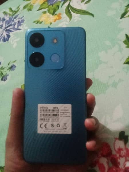 infinix smart7  1 manth used good condition  with  box charger 4