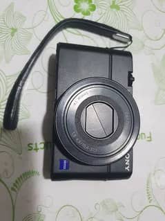 Sony rx100 Mark 2 with 2 batteries card and leather strip cover 0