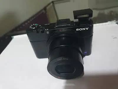 Sony rx100 Mark 2 with 2 batteries card and leather strip cover 3