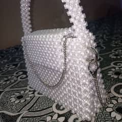 white beaded bag