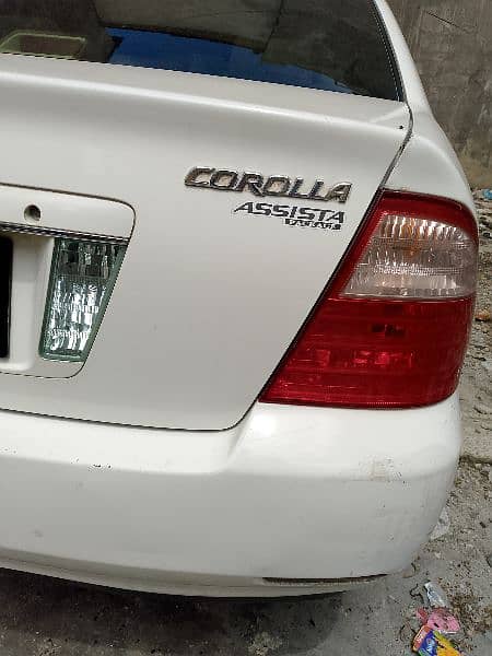 x corolla121white colour 4