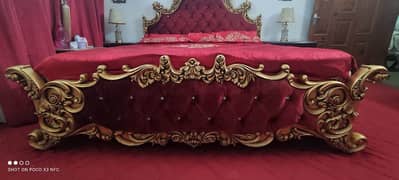 wooden bed with cushioning in excellent condition 0
