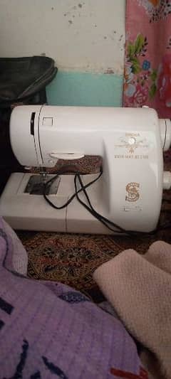 sewing machine and embroidery designs mechanic 0