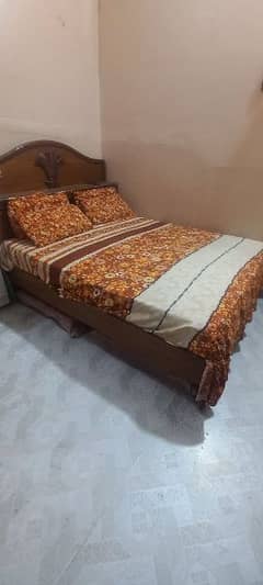 wooden bed good condition completed bed