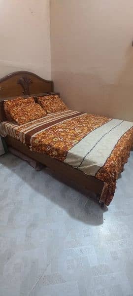 wooden bed good condition completed bed 0