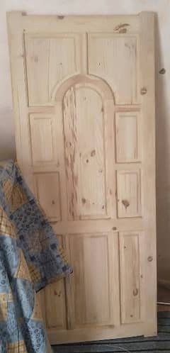 made of wood door length of door is 7 ft and width is 33 inch