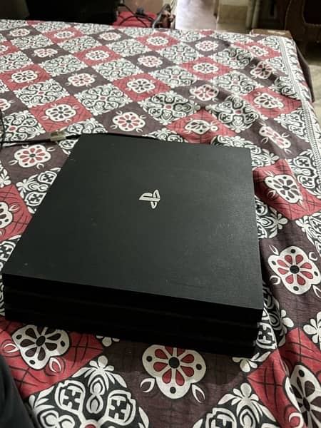 PS 4 pro with 2 controllers 1