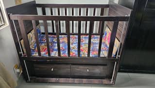 Wooden Baby Cot in New Condition. hardly used