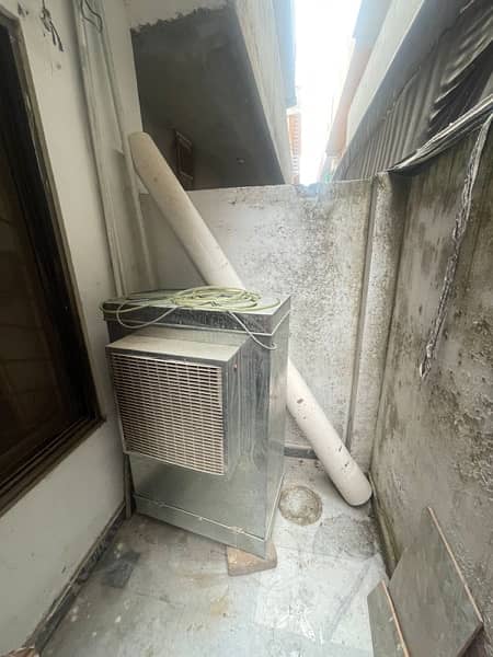 AC COOLER ONLY USED FOR THREE MONTHS BECAUSE WE LEFT THE COUNTRY 2