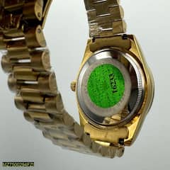 Rollex watch in golden colour 0