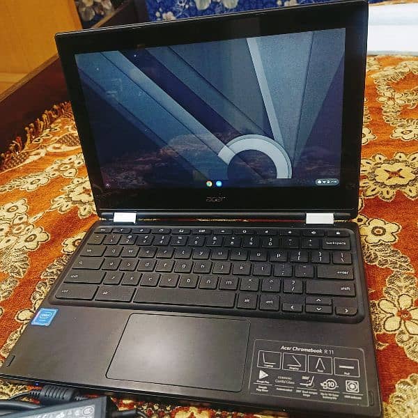 Chromebook new touch 10/10 condition only 2 months used by nephew. 0