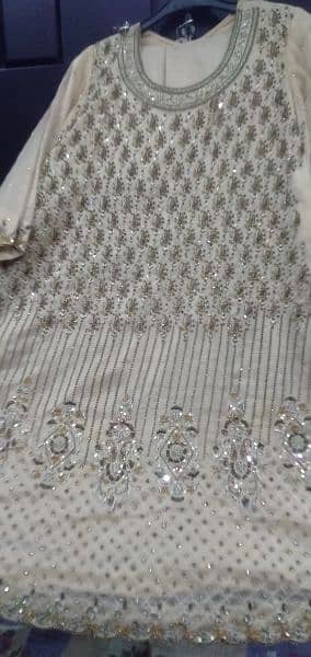 Golden shirt in heavy work with full gher gharara, golden duppta 1