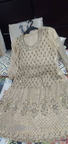 Golden shirt in heavy work with full gher gharara, golden duppta 4