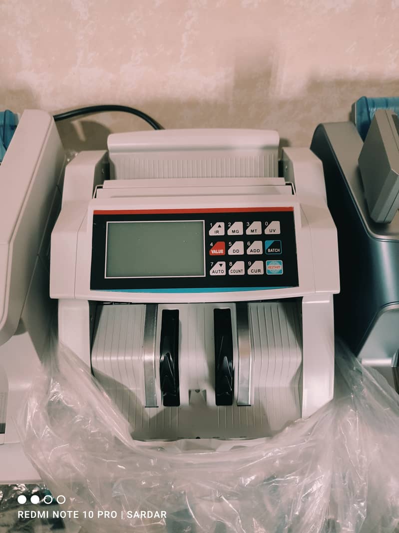 cash counting machine, mix value sorting machine, packet counter SM 15